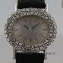 Omega con diamanti