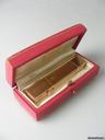 Cartier Lipstickwatch-en or massif-montre mecanique se trouvant dans un rouge o lEvre-ultra rare-etui original-vers 1930.
