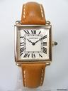 Cartier Tank Obus or jaune /cuir