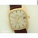 Omega De Ville 9ct gold automatic on strap
