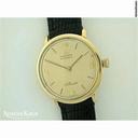 Movado Sillhouette 18ct gold automatic on strap