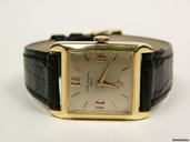 Patek Philippe rectangular yellow gold with leather strap