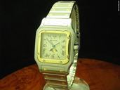 Cartier Santos 18kt Gold / Edelstahl Mondphase Unisexuhr