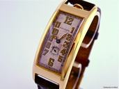 Movado Polyplan, 18k Yellow Gold