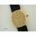 Baume & Mercier &  Baumatic 18ct gold automatic on strap