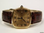 Baume & Mercier Baumatic yellow gold and leather strap Mod.37069