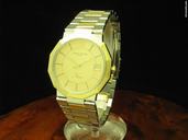 Baume & Mercier &  Riviera 18kt. Gold/ Edelstahl Herrenuhr