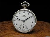 Omega Edelstahl Open Face Taschenuhr / Orig. Blatt