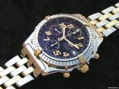 Breitling Chrono Vitesse Stahl/Gold mit Pilotarmband schwarz