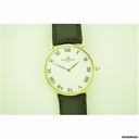 Baume & Mercier &  18ct gold quartz on strap