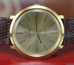 Omega De Ville NOS 18K gold Box & Papers 1974 rare vintage
