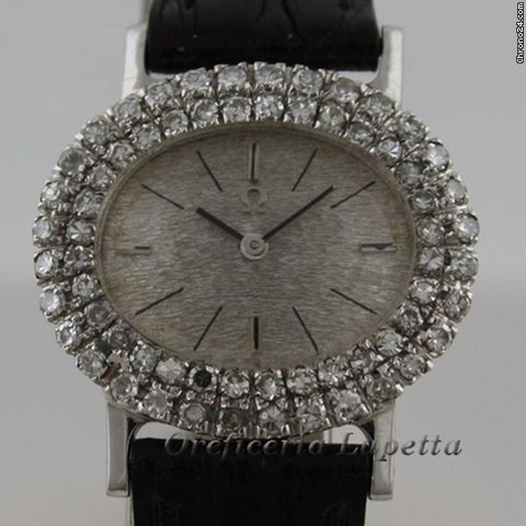 Omega con diamanti