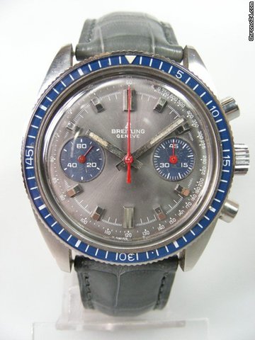 Breitling Chronographe vintage cadran ardoise deux compteurs et lunette bakelite bleus