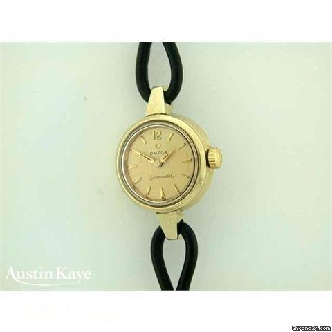 Omega Seamaster gold capped manual on strap