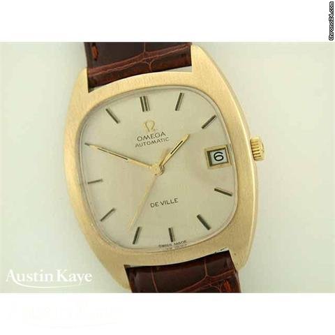 Omega De Ville 9ct gold automatic on strap