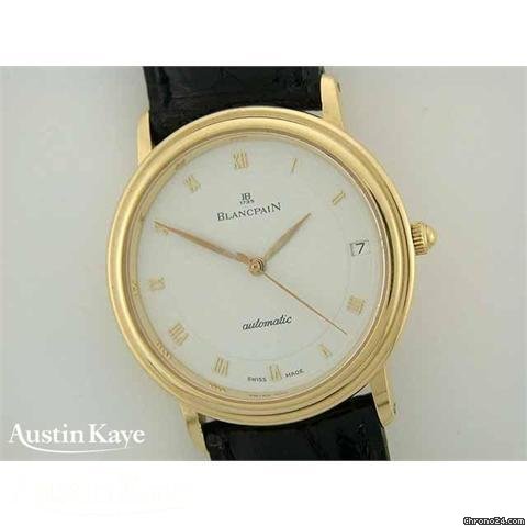 Blancpain 18ct gold automatic on strap