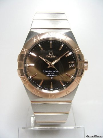 Omega Constellation Co-Axial big size or rose gold/steel cadran marron/brun dial