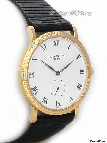 replica Patek Philippe Mens Calatrava - Reference 3919 J - 33mm 18k Yellow Gold - Hobnail Textured Bezel - Discontinued Model WATCHES 1 