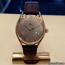 Omega mechanical gold cape