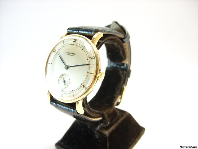 replica Longines Or massif 18K annees 1950 WATCHES 1 