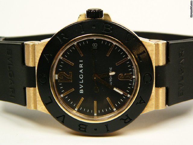 Bulgari Diagono yellow gold and rubber AL38G