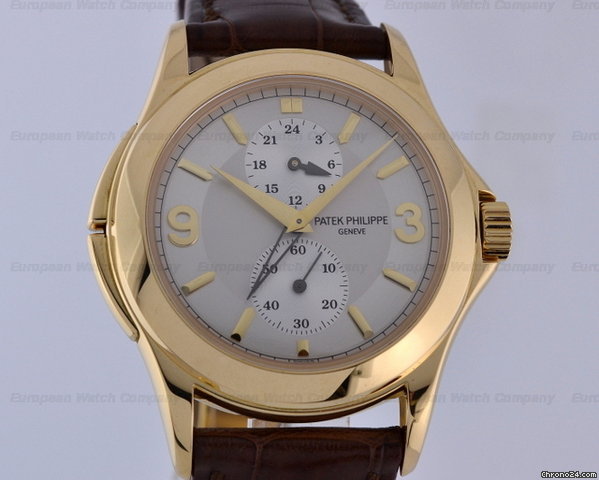 Patek Philippe Travel Time 18K Yellow Gold Manual 37MM