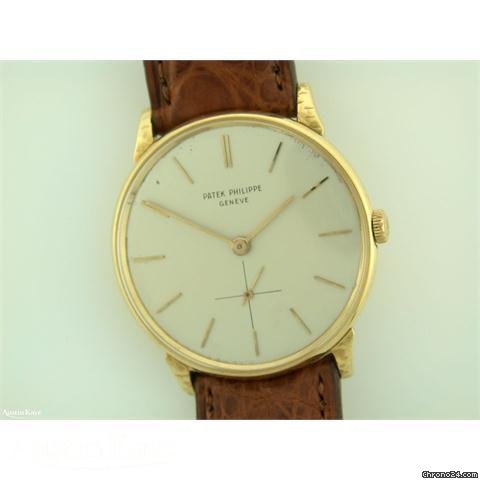 Patek Philippe Calatrava 18ct gold mnaual on strap
