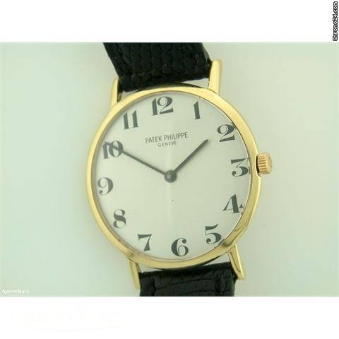 Patek Philippe Mid-Size  18ct gold manual on strap