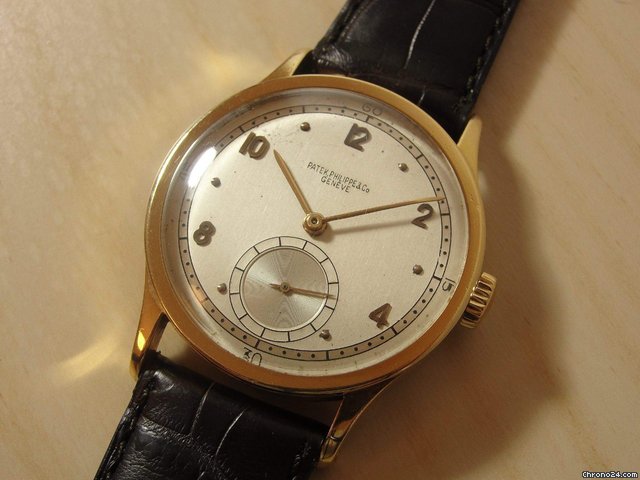 Patek Philippe ref 570 yellow gold with two tone dial.