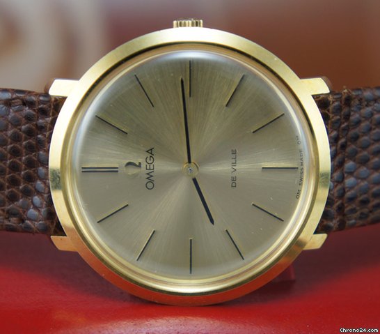 Omega De Ville NOS 18K gold Box & Papers 1974 rare vintage